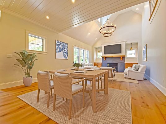 Chandelier, Dining room, Fireplace, Interior, Living room, Pendant Lights, Recessed Lighting, Wood Texture Flooring