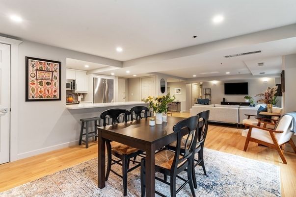 Dining room, Interior, Kitchen, Living room, Recessed Lighting, Stainless Steel Appliances, Wood Texture Flooring