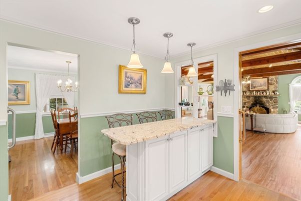 Chandelier, Dining room, Fireplace, Interior, Pendant Lights, Recessed Lighting, Wooden Beams, Wood Texture Flooring