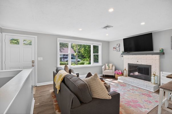 Fireplace, Interior, Living room, Recessed Lighting, Wood Texture Flooring