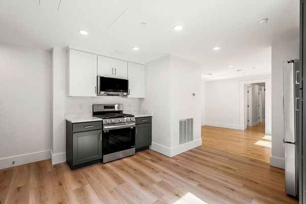 Interior, Kitchen, Recessed Lighting, Stainless Steel Appliances, Wood Texture Flooring