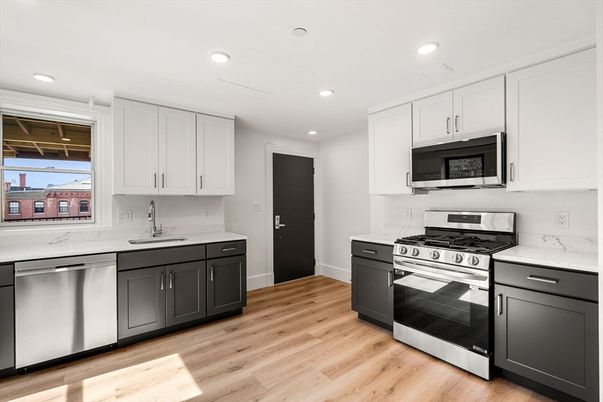 Interior, Kitchen, Recessed Lighting, Stainless Steel Appliances, Wood Texture Flooring