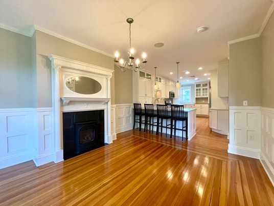 Chandelier, Empty room, Fireplace, Interior, Kitchen, Pendant Lights, Recessed Lighting, Wood Texture Flooring