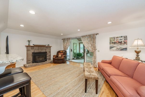 Fireplace, Interior, Living room, Recessed Lighting, Wood Texture Flooring