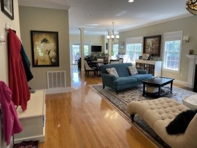 Chandelier, Dining room, Fireplace, Interior, Living room, Recessed Lighting, Wood Texture Flooring