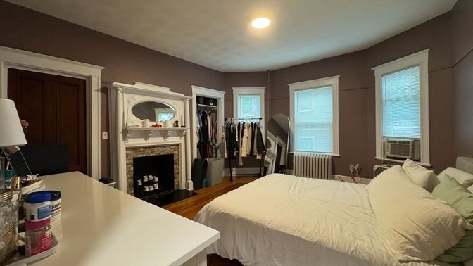 Bedroom, Fireplace, Interior, Recessed Lighting, Wood Texture Flooring