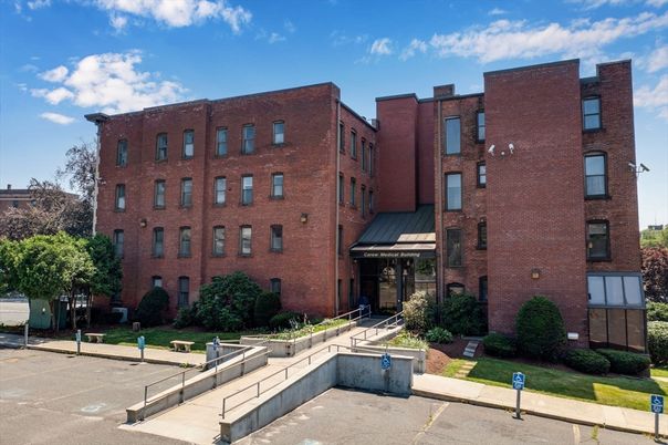 Exterior, Facade, Brick Facade, Condo Building