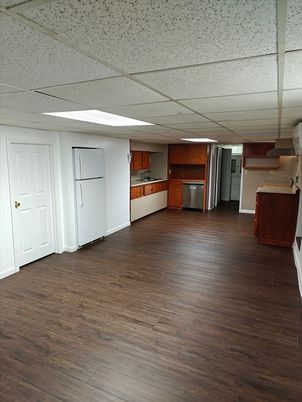 Empty room, Interior, Kitchen, Stainless Steel Appliances, Wood Texture Flooring