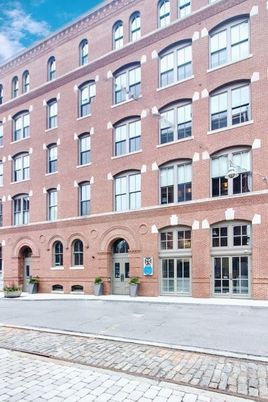 Exterior, Facade, Brick Facade, Condo Building