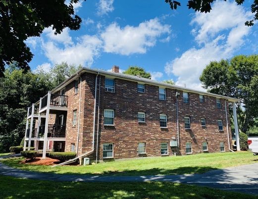 Exterior, Facade, Brick Facade, Condo Building