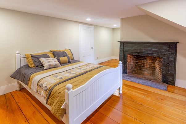 Bedroom, Fireplace, Interior, Recessed Lighting, Wood Texture Flooring