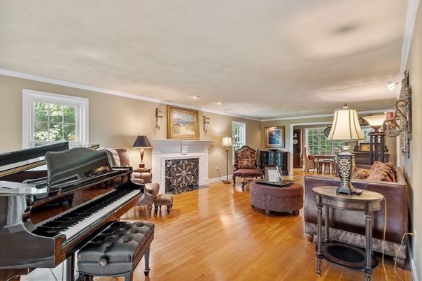 Fireplace, Interior, Living room, Piano, Recessed Lighting, Wood Texture Flooring
