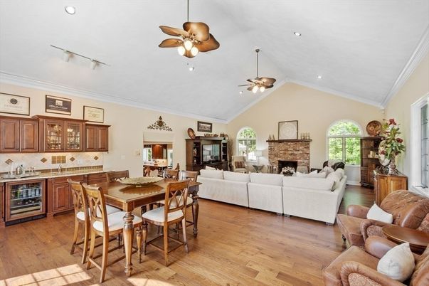 Dining room, Fireplace, Interior, Living room, Recessed Lighting, Wood Texture Flooring