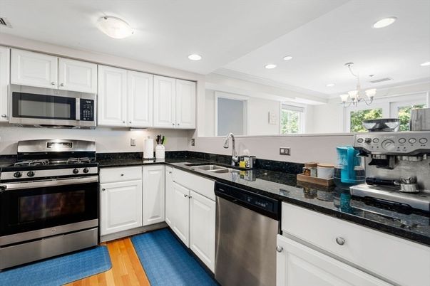 Chandelier, Interior, Kitchen, Recessed Lighting, Stainless Steel Appliances, Wood Texture Flooring