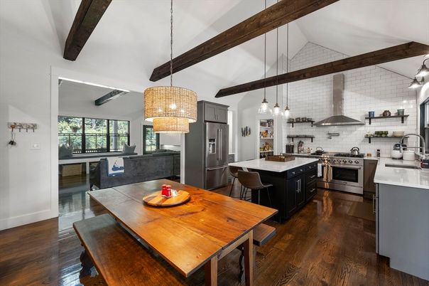 Chandelier, Dining room, Interior, Kitchen, Pendant Lights, Stainless Steel Appliances, Wooden Beams, Wood Texture Flooring