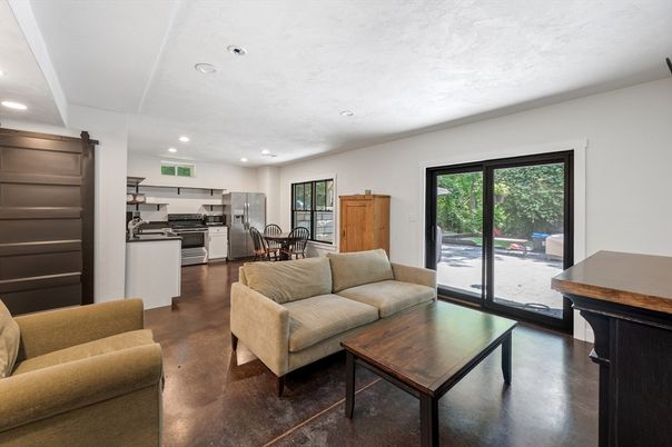 Dining room, Interior, Kitchen, Living room, Recessed Lighting, Stainless Steel Appliances, Wood Texture Flooring