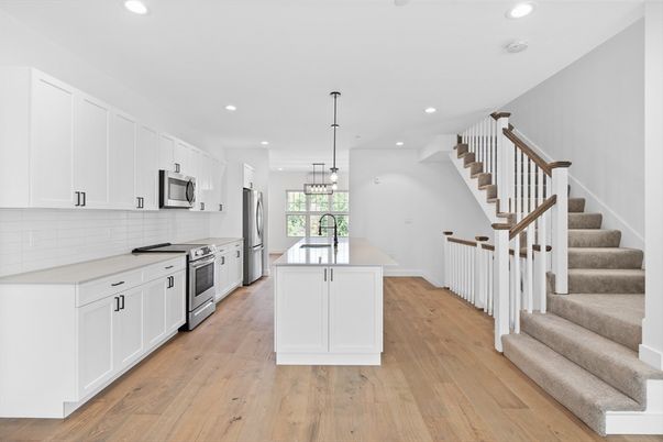Interior, Kitchen, Pendant Lights, Recessed Lighting, Stainless Steel Appliances, Wood Texture Flooring