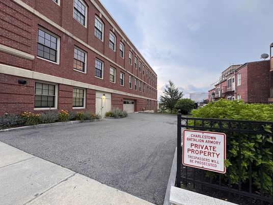 Exterior, Facade, Brick Facade, Condo Building