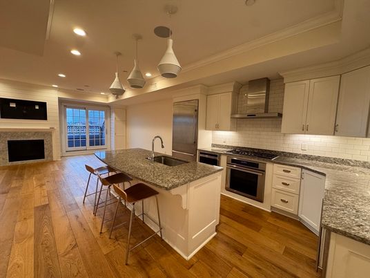 Fireplace, Interior, Kitchen, Pendant Lights, Recessed Lighting, Stainless Steel Appliances, Wood Texture Flooring