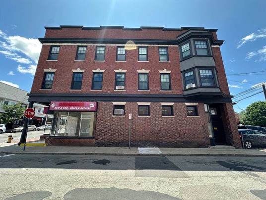 Exterior, Facade, Brick Facade, Condo Building