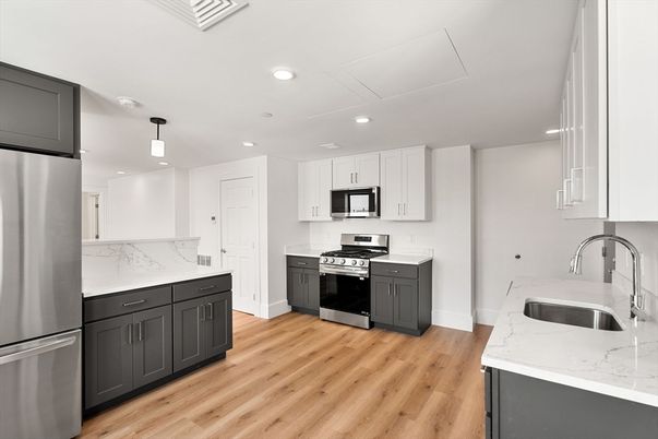 Interior, Kitchen, Pendant Lights, Recessed Lighting, Stainless Steel Appliances, Wood Texture Flooring