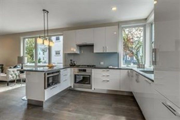 Chandelier, Dining room, Interior, Kitchen, Pendant Lights, Recessed Lighting, Stainless Steel Appliances, Wood Texture Flooring