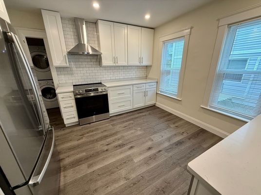 Interior, Kitchen, Recessed Lighting, Stainless Steel Appliances, Washer, Wood Texture Flooring