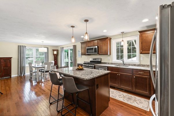 Dining room, Interior, Kitchen, Pendant Lights, Recessed Lighting, Stainless Steel Appliances, Wood Texture Flooring