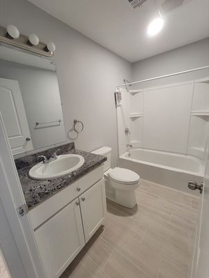 Bathroom, Dual Sink Vanities, Interior, Recessed Lighting, Wood Texture Flooring