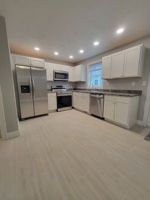 Interior, Kitchen, Recessed Lighting, Stainless Steel Appliances, Wood Texture Flooring