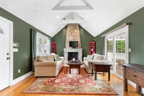 Fireplace, Interior, Living room, Recessed Lighting, Stone Walls, Wood Texture Flooring