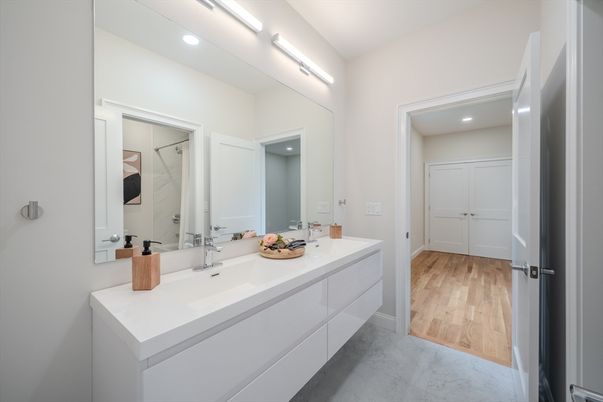 Bathroom, Dual Sink Vanities, Interior, Recessed Lighting, Wood Texture Flooring