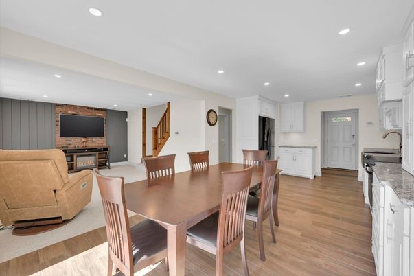 Dining room, Fireplace, Interior, Kitchen, Living room, Recessed Lighting, Wood Texture Flooring