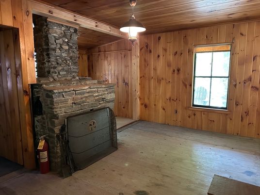 Empty room, Fireplace, Interior, Pendant Lights, Stone Walls, Wooden Ceilings, Wood Texture Flooring, Wooden Walls