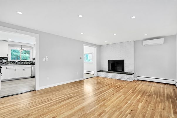 Empty room, Fireplace, Interior, Recessed Lighting, Wood Texture Flooring