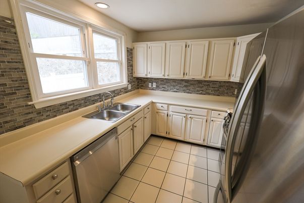 Interior, Kitchen, Recessed Lighting, Stainless Steel Appliances, Stone Walls