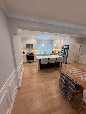 Dining room, Interior, Kitchen, Pendant Lights, Recessed Lighting, Stainless Steel Appliances, Wood Texture Flooring