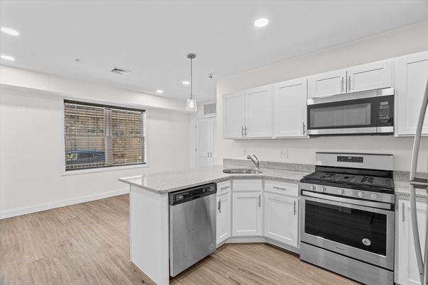 Interior, Kitchen, Pendant Lights, Recessed Lighting, Stainless Steel Appliances, Wood Texture Flooring