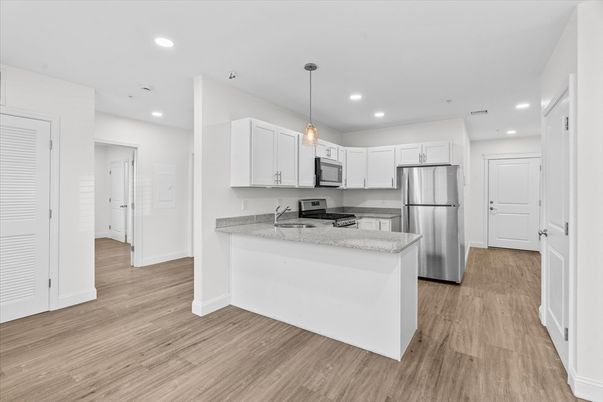 Interior, Kitchen, Pendant Lights, Recessed Lighting, Stainless Steel Appliances, Wood Texture Flooring