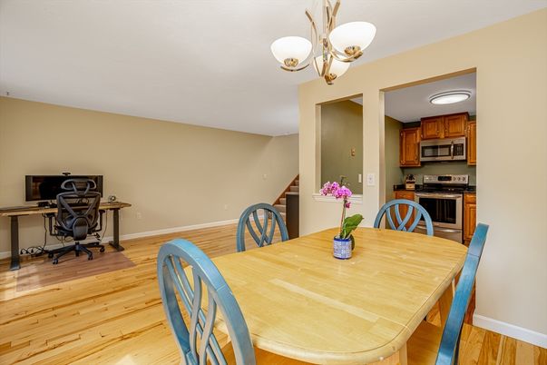 Chandelier, Dining room, Interior, Kitchen, Stainless Steel Appliances, Wood Texture Flooring