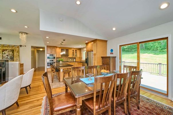 Dining room, Interior, Kitchen, Pendant Lights, Recessed Lighting, Stainless Steel Appliances, Wood Texture Flooring