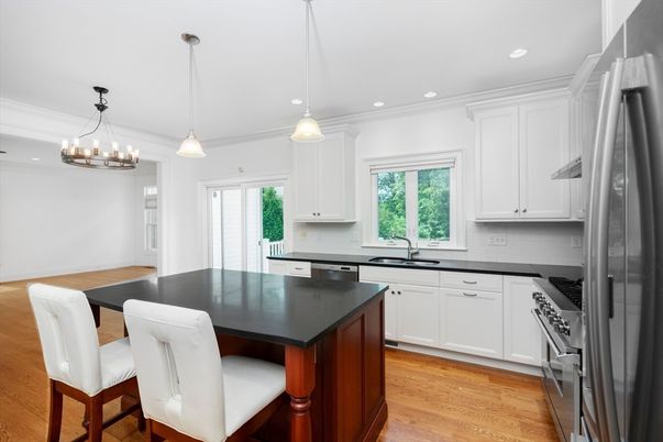 Chandelier, Interior, Kitchen, Pendant Lights, Recessed Lighting, Stainless Steel Appliances, Wood Texture Flooring