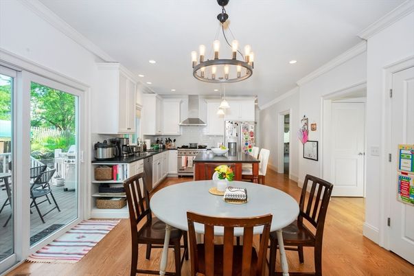 Chandelier, Dining room, Interior, Kitchen, Pendant Lights, Recessed Lighting, Stainless Steel Appliances, Wood Texture Flooring