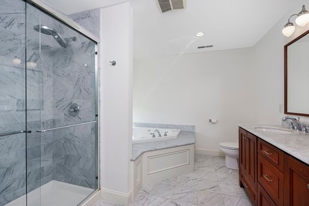 Bathroom, Dual Sink Vanities, Glass Shower, Interior, Marble, Marble Walls, Recessed Lighting