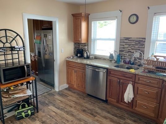 Interior, Kitchen, Pendant Lights, Stainless Steel Appliances, Stone Walls, Wood Texture Flooring
