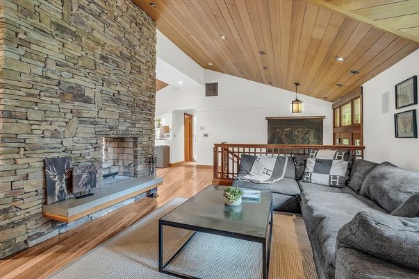 Fireplace, Interior, Living room, Pendant Lights, Recessed Lighting, Stone Walls, Wooden Ceilings, Wood Texture Flooring