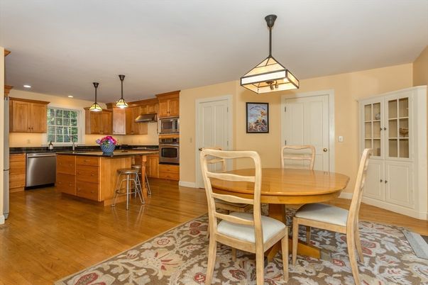 Dining room, Interior, Kitchen, Pendant Lights, Recessed Lighting, Stainless Steel Appliances, Wood Texture Flooring