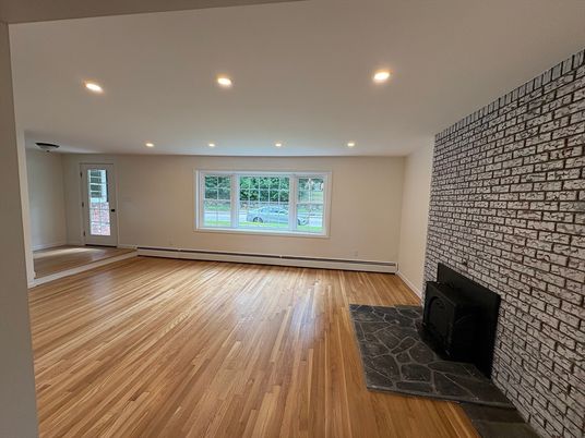 Empty room, Fireplace, Interior, Recessed Lighting, Wood Texture Flooring