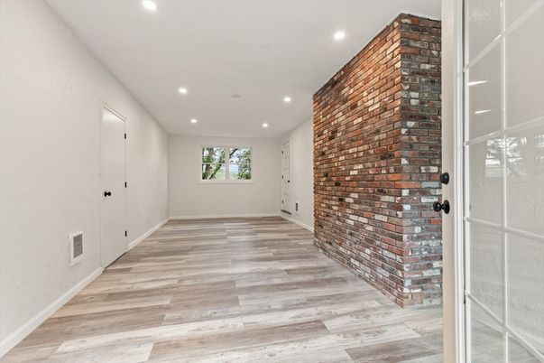 Empty room, Interior, Recessed Lighting, Stone Walls, Wood Texture Flooring