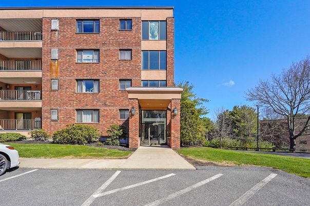 Exterior, Facade, Brick Facade, Condo Building